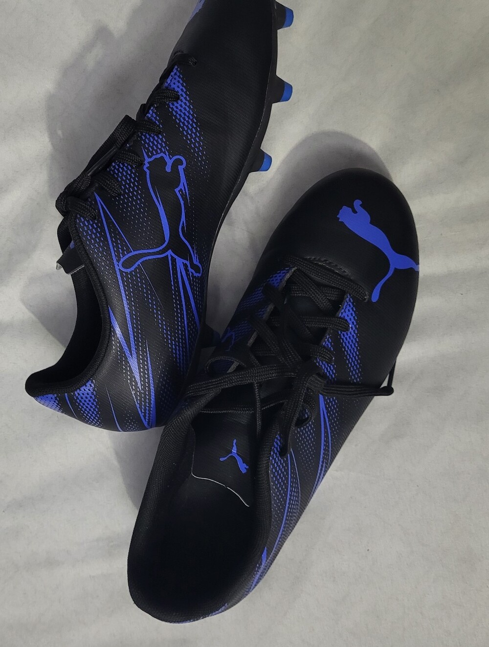 Puma Youth / Men’s Black and Blue Soccer Cleats